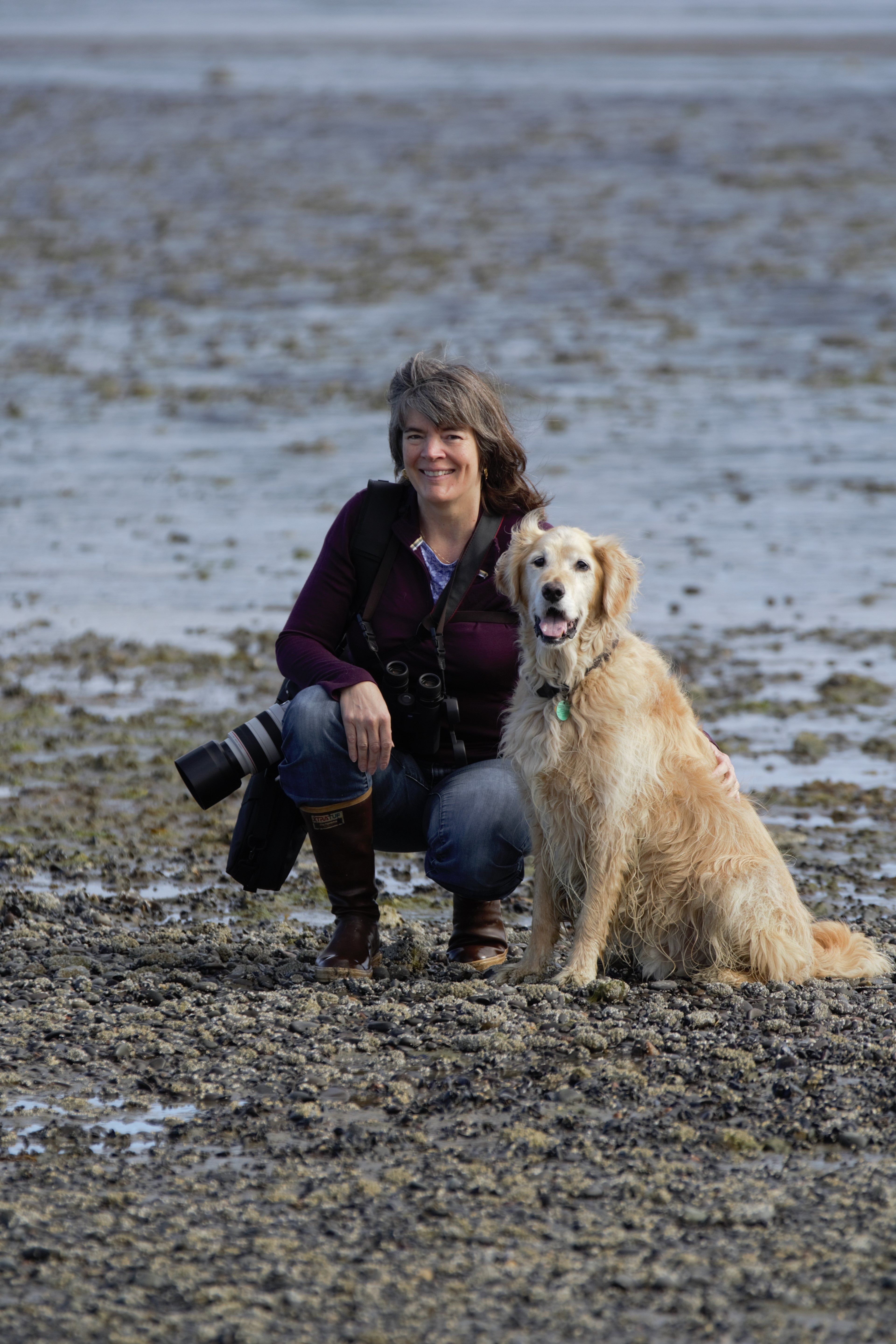 Woman and dog on beach